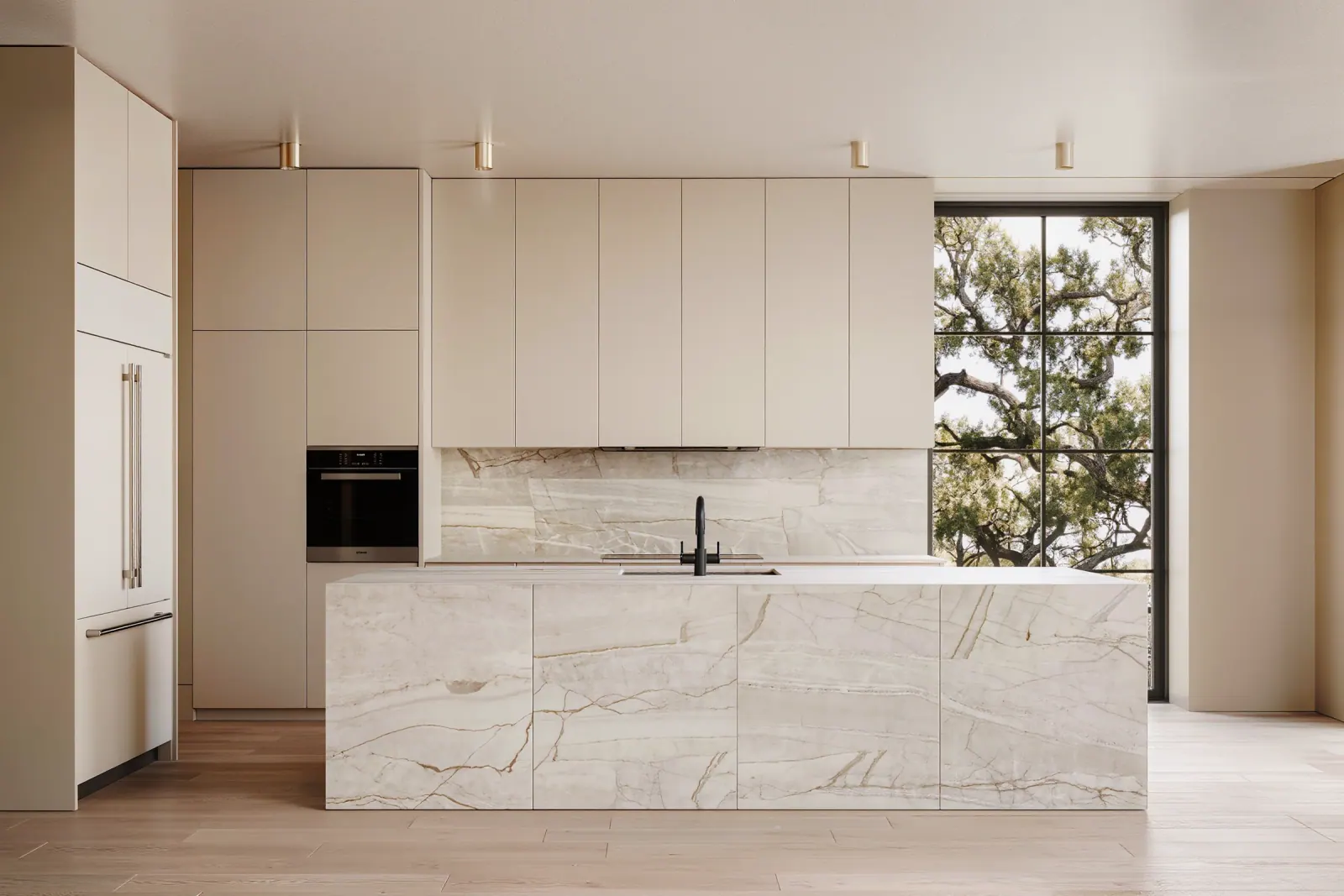Minimal cream kitchen with a monolithic limestone island and steel-framed window