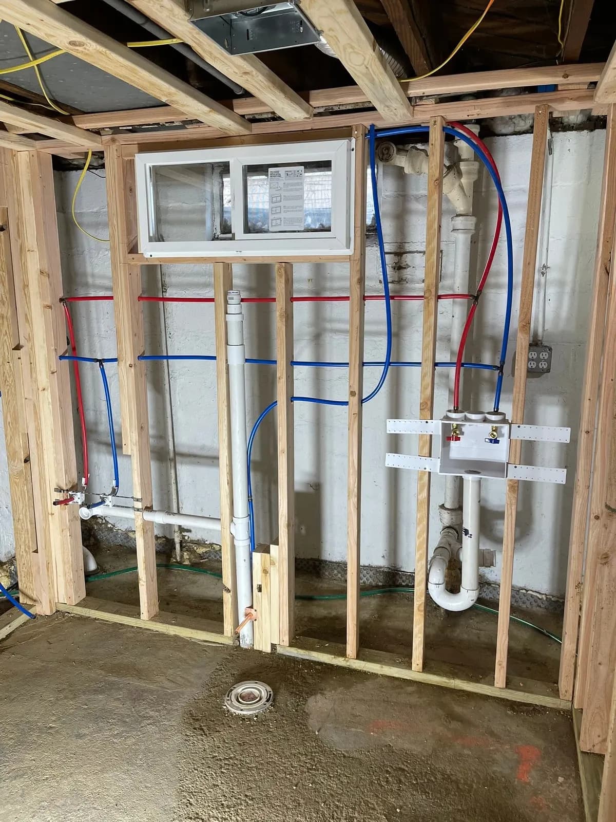 New supply and drain plumbing roughed into the framed walls