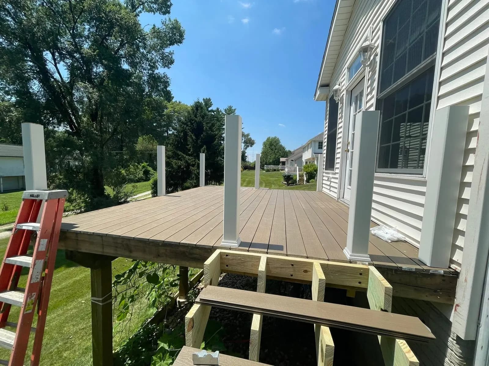 After: the new deck from the side showing the posts and skirt framing