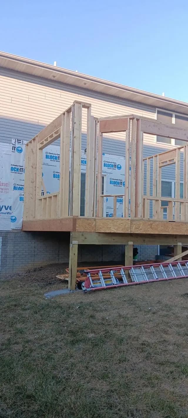 Floor joists cantilevered over the foundation posts from below