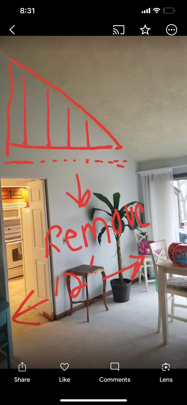 The homeowner's red-marker note on the wall reading Remove, with an arrow to the section coming out