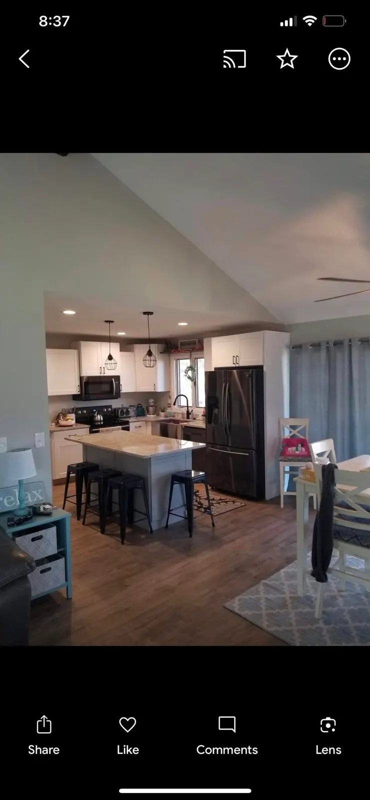 After: a second kitchen in the same style with a vaulted ceiling and granite island